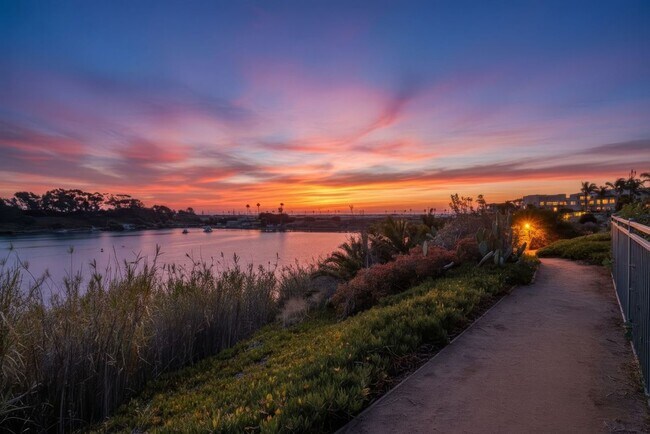 Building Photo - Carlsbad Condo West of 5 Freeway with Lagoon Access - Available Now!
