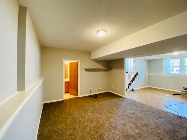 Building Photo - {1601} Spacious Duplex + Two Car Garage + Finished Basement + Fort Osage School District