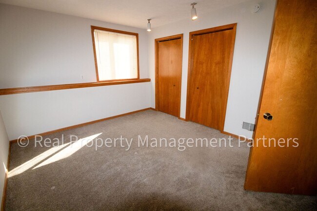 Building Photo - 2 Bed, 1 Bath Lower-Level Unit with Garage Parking and Trail Access