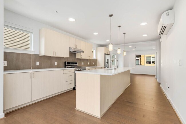 Building Photo - Modern Townhome in Upton at Crossroads Village – Stylish Living in a Prime Location