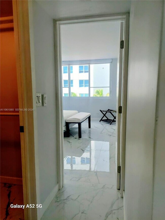 Building Photo - 5005 Collins Ave