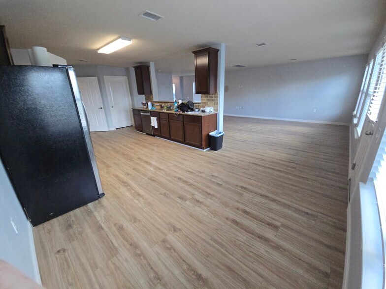 Breakfast nook/kitchen/living room - new flooring - 10116 Deer Chase Trl