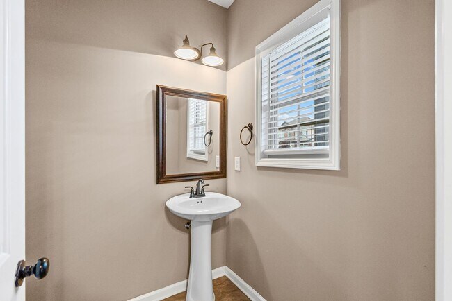 Building Photo - Four Bedroom with Three Car Garage!