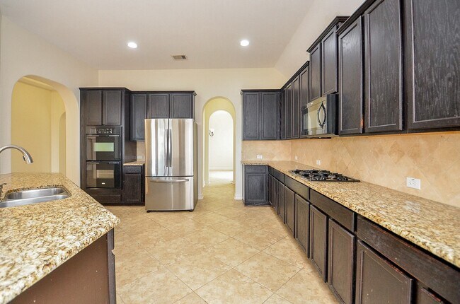 Building Photo - 6510 Arroyo Springs Ln