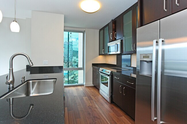 Building Photo - Convenient Luxury Living!! WELCOME TO WAIH...