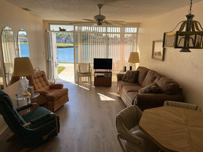 Building Photo - 1/1 Furnished with Lake View & Utilities in Tahitian Gardens a 55+ Community.