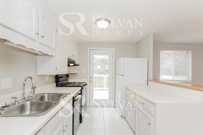 Building Photo - Turn the key. Enter. Smile. Repeat every day!