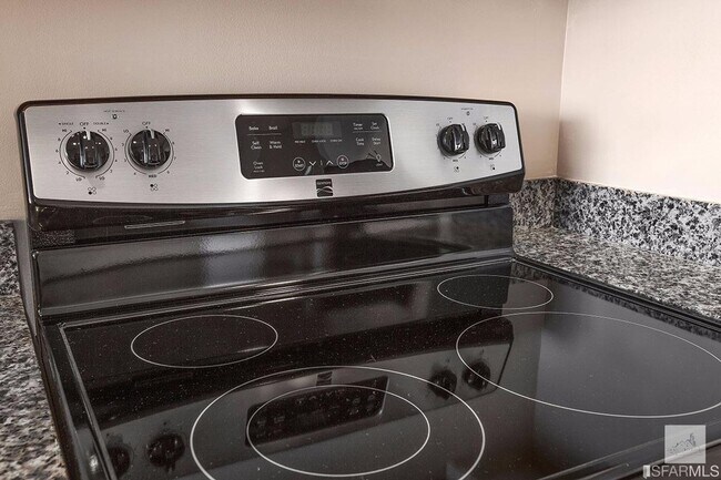 Building Photo - Spacious One-Bedroom Elegance in a Luxury Doorman Building with EV Parking