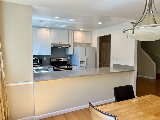 Building Photo - Great Natural light, Treetop Views with 2 Primary Suites plus OFFICE and a 2 car garage, It is li...