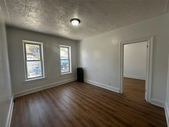 Building Photo - 26-33 96th St