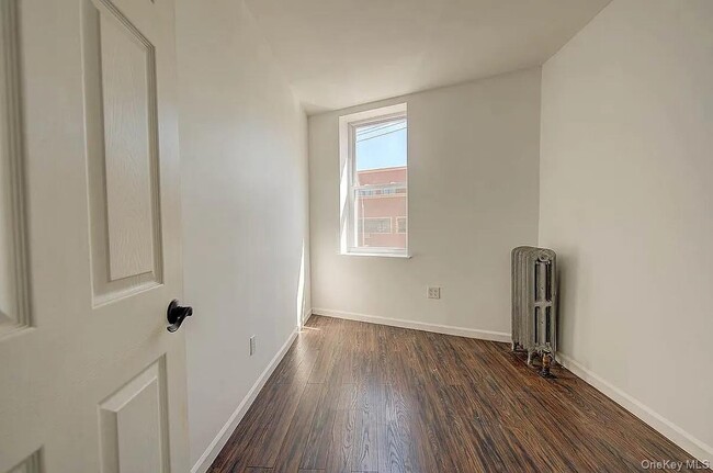 Building Photo - 72-52 Metropolitan Ave