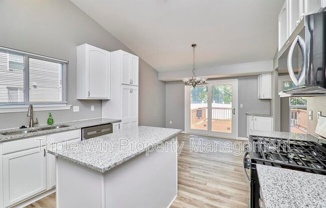 Building Photo - 4927 Triple Tree Ct