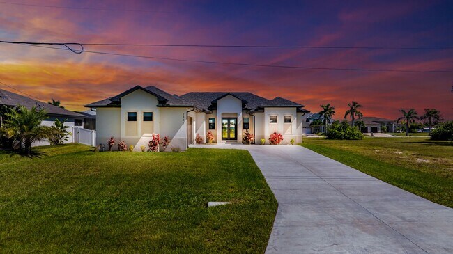 Building Photo - Brand-New Coastal Retreat | 4BR Home in NW Cape Coral