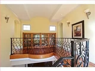 Building Photo - "Elegant 5-Bedroom Oasis with 4 Luxurious ...