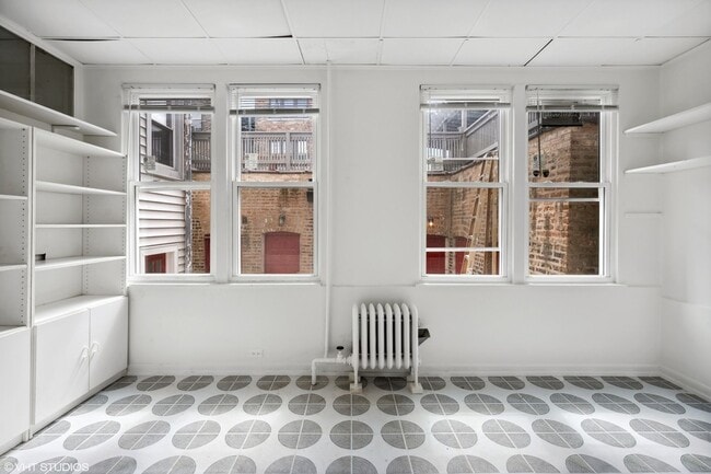 Building Photo - 1233 W North Shore Ave