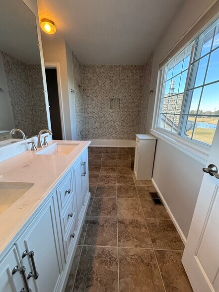 Brand new vanity and shower tile! - 2172 S. Victor St.