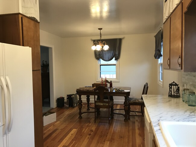 Galley style kitchen with eating area - 2614 Highwood Dr