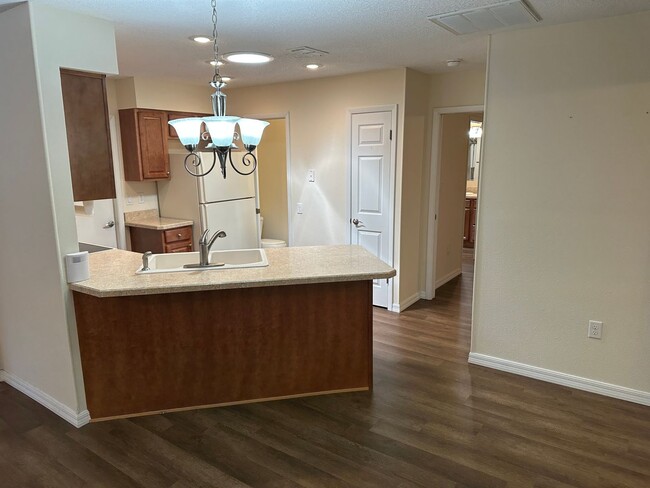 Building Photo - Experience Maintenance-Free 55+ Living at The Cove at Tavares Village!