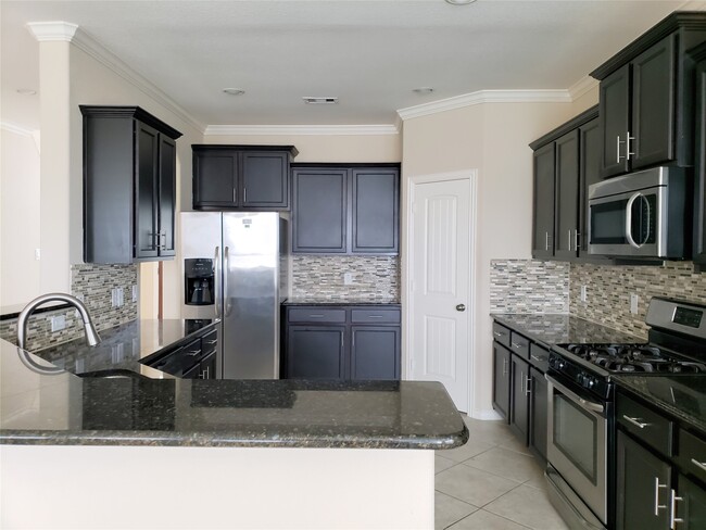Building Photo - 8818 Cornina Dr