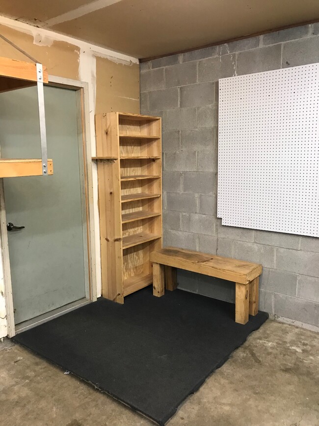 Convenient shoe shelfs and bench at entry door - 8524 S Maplebrook Circle