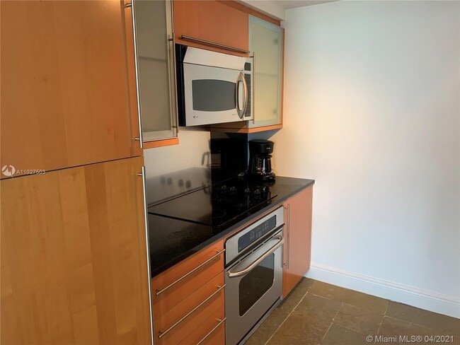 Building Photo - 6365 Collins Ave