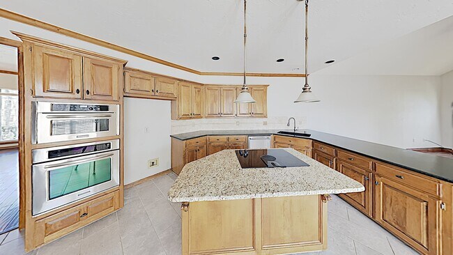 Building Photo - 4 Bedroom 3 Bathroom 3 Car Garage with Sto...