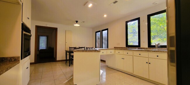 Building Photo - Remodeled secluded wooded oasis off of Qualla Road with handicap access
