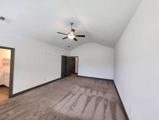 Building Photo - 5814 Whispering Pnes Wy