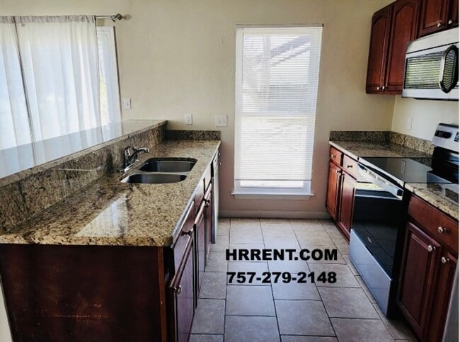 Building Photo - Coming soon….Wonderful 3 Bedroom 1.5 Bathroom Single Family Home located in the Churchland School...