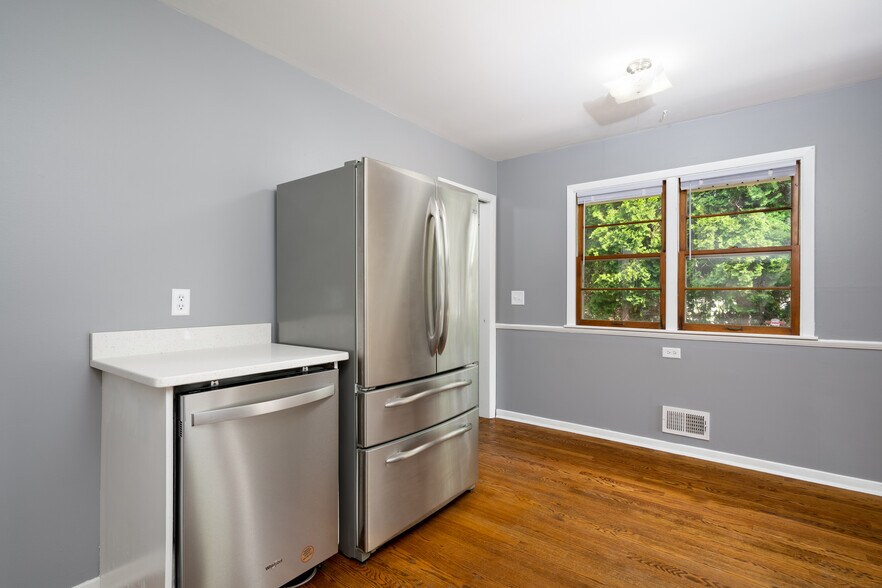 Kitchen with New Fridge and Dishwasher - 5312 Hiawatha Ln