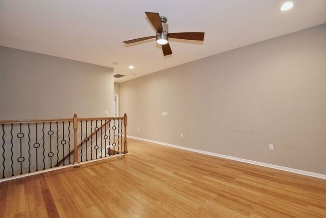 Building Photo - Gorgeous 4/2.5 Spacious Townhome with a Loft Area and a 2 Car Garage in the Desirable Gated Commu...