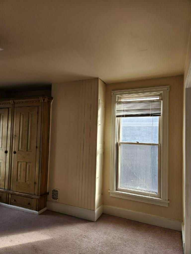 Living room with Built in Armoire - 1318 N Main St