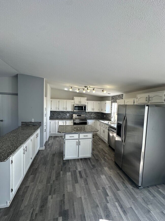 Building Photo - MODERN UPGRADES AND RURAL LIVING IN PEYTON