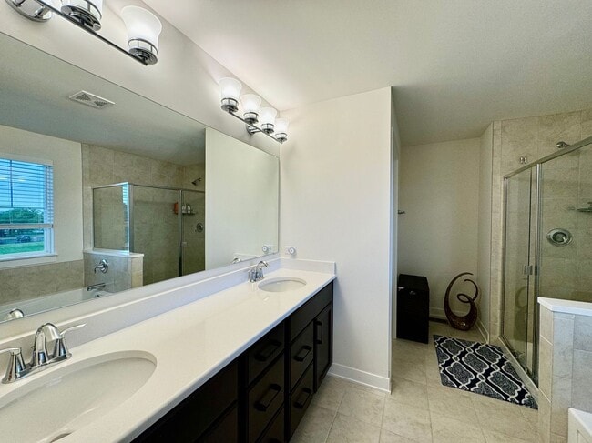 Building Photo - Newly Built 5-bedroom featuring luxe finishes and a spa-inspired master suite.
