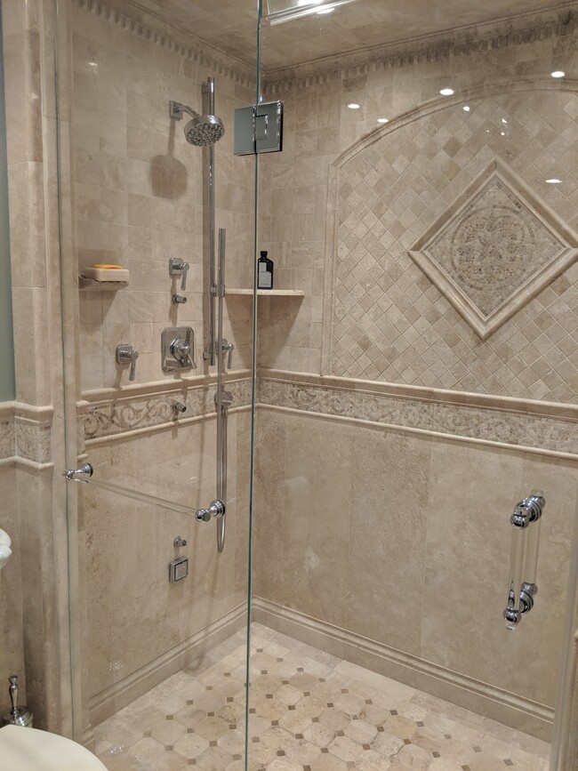 Travertine walk in glass shower - 8290 Armetale Ln