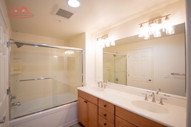 Building Photo - Charming 1 Bedroom/1 Bath Condo with Private Backyard & Double Parking Spaces