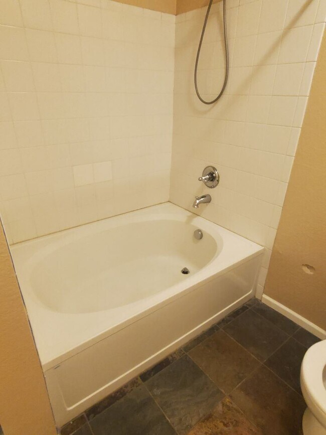 Building Photo - Spacious 2B/2B Main Level Condo With Garage NOW AVAILABLE