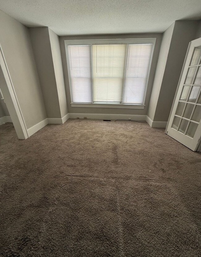 Building Photo - 1404 W. Fourth St. - 3 Unit