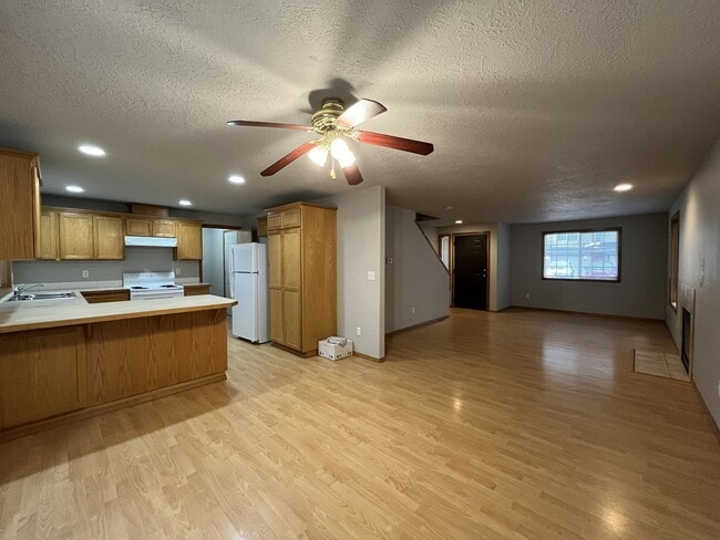 Building Photo - 3-Bed Home with Fireplace, Fenced Backyard, 2 Car Garage & Front Patio!