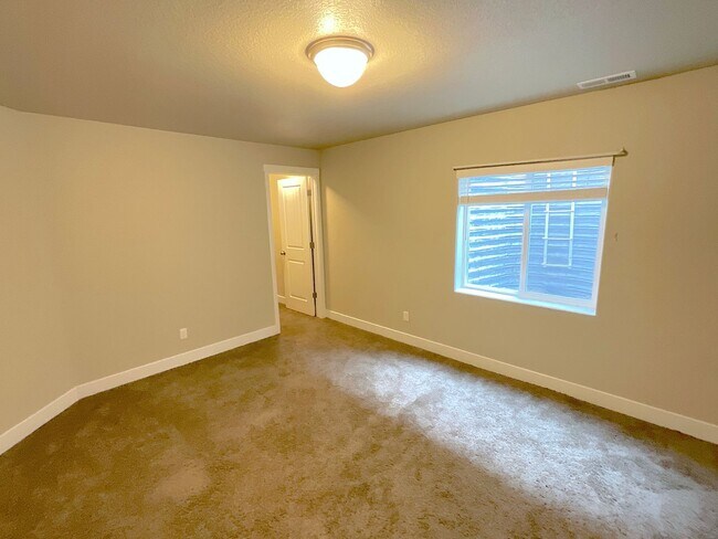 Building Photo - 4 Bedroom Home Available Near Woodmoor Dr ...