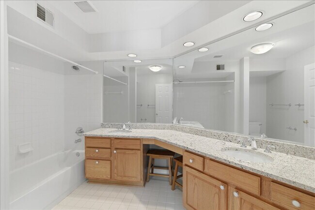 Building Photo - "Luxurious 2-Bed Condo with, loft, Granite Elegance & Hardwood Charm in Reston, VA!"