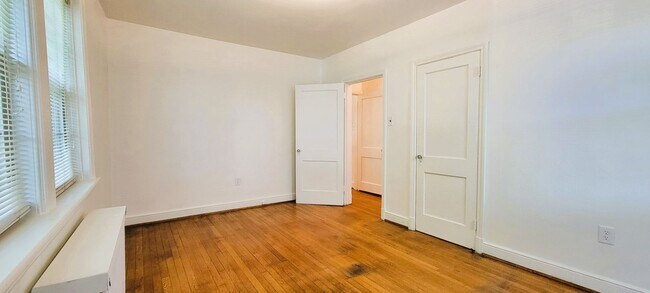 Building Photo - Remodeled brick bungalow with 1st floor li...