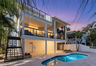 Building Photo - 8485 Blind Pass Dr