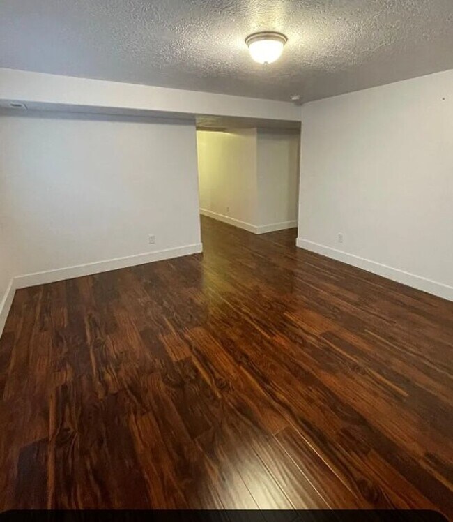 Building Photo - Spacious 4-Bedroom Home with Finished Basement in Taylorsville