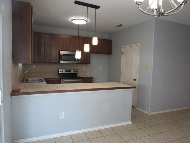 Building Photo - 9310 Albany Dr