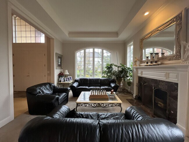 Building Photo - Executive-Style Northwest Heights Home with Forest Views and Refined Architectural Details