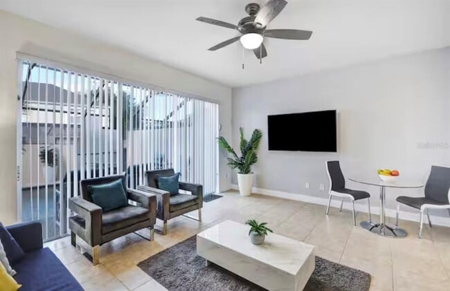 Building Photo - 8117 Princess Palm Ln