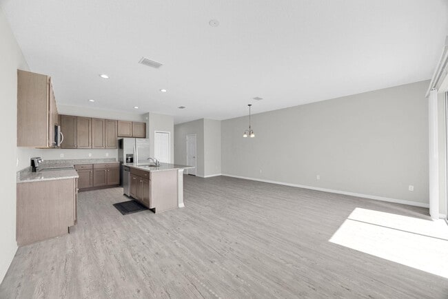 Building Photo - 6321 Tillandsia Pl