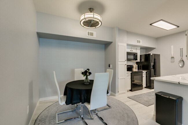 Building Photo - Stylish Fully Furnished 1BR Condo with Private Patio & Custom Closet