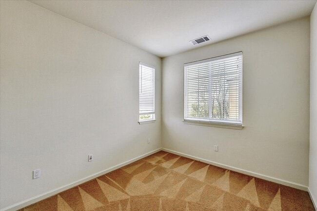 Building Photo - PRIME CORNER HOME NEAR TRAILS LIGHT-FILLED...